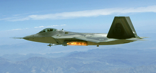 Illustration for article titled Cool photos of Raptors firing missiles from their hidden weapons bays